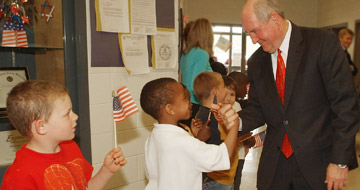 Governor Sonny Perdue greeting children